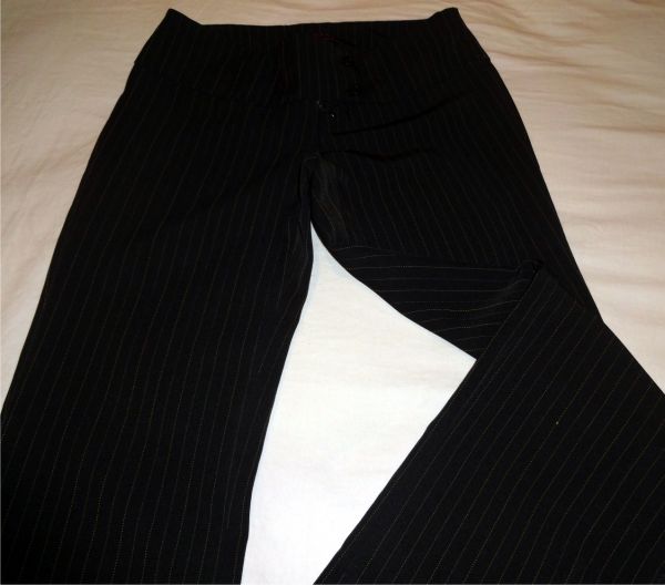 Calça preta com riscas amarelas SWANY tam. P